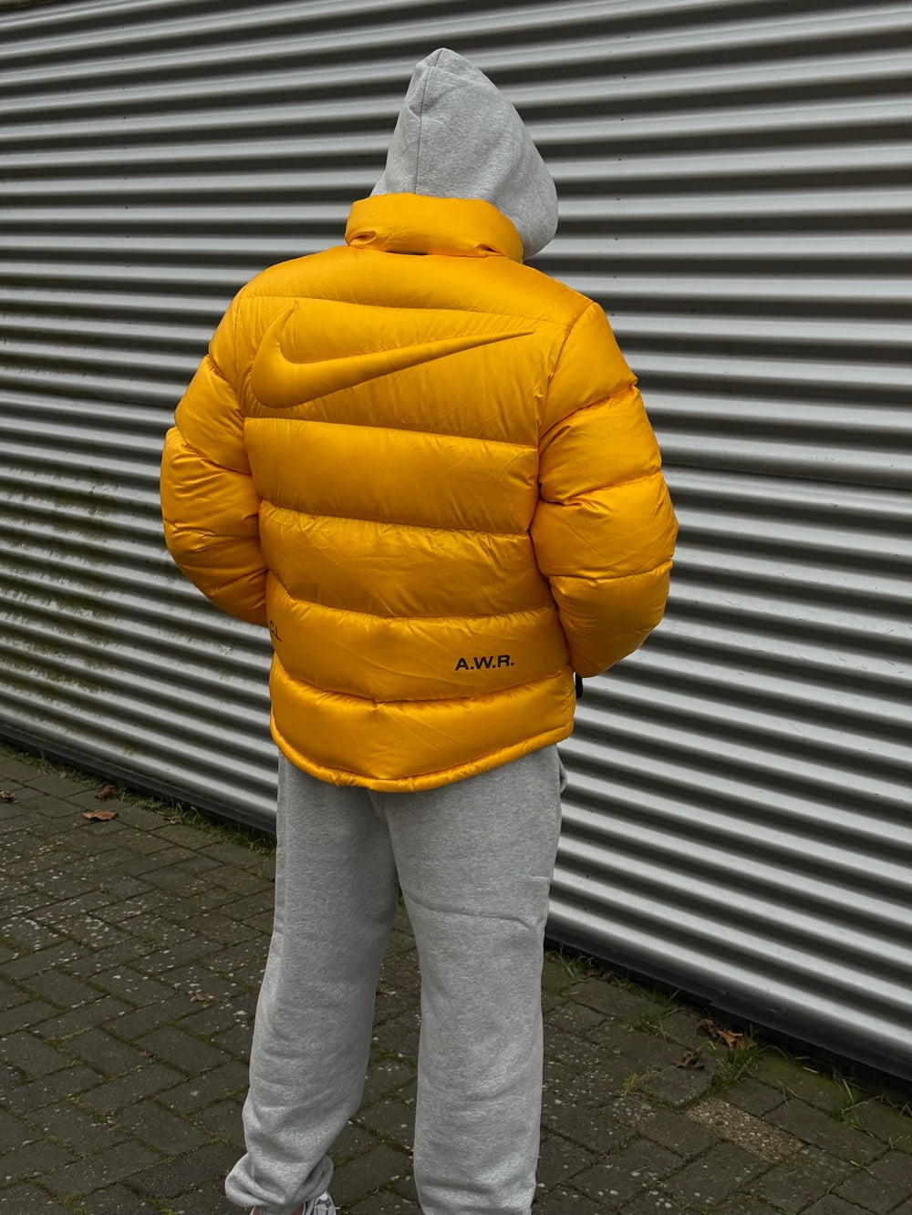 NOCTA Sunset Puffer Jacket Yellow